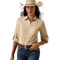 A woman wearing a light beige western-style button-up shirt with rolled sleeves, a matching straw cowboy hat, and blue jeans, photographed against a plain white background.