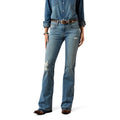 Person wearing blue jeans and a denim shirt on a white background