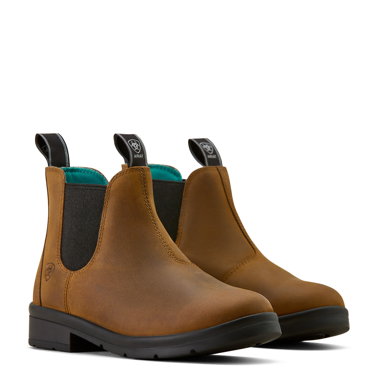 Pair of brown leather boots with black soles on a white background kids elastic 