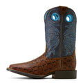 Brown cowboy boot with blue embroidered design on a white background