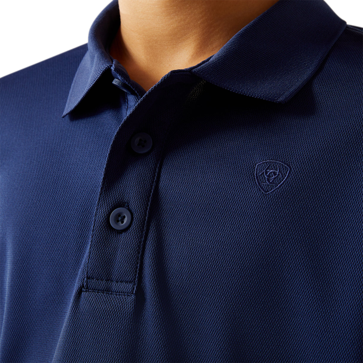 Navy blue polo shirt with a logo on a white background