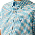 Blue and white checkered shirt with a logo on a white background