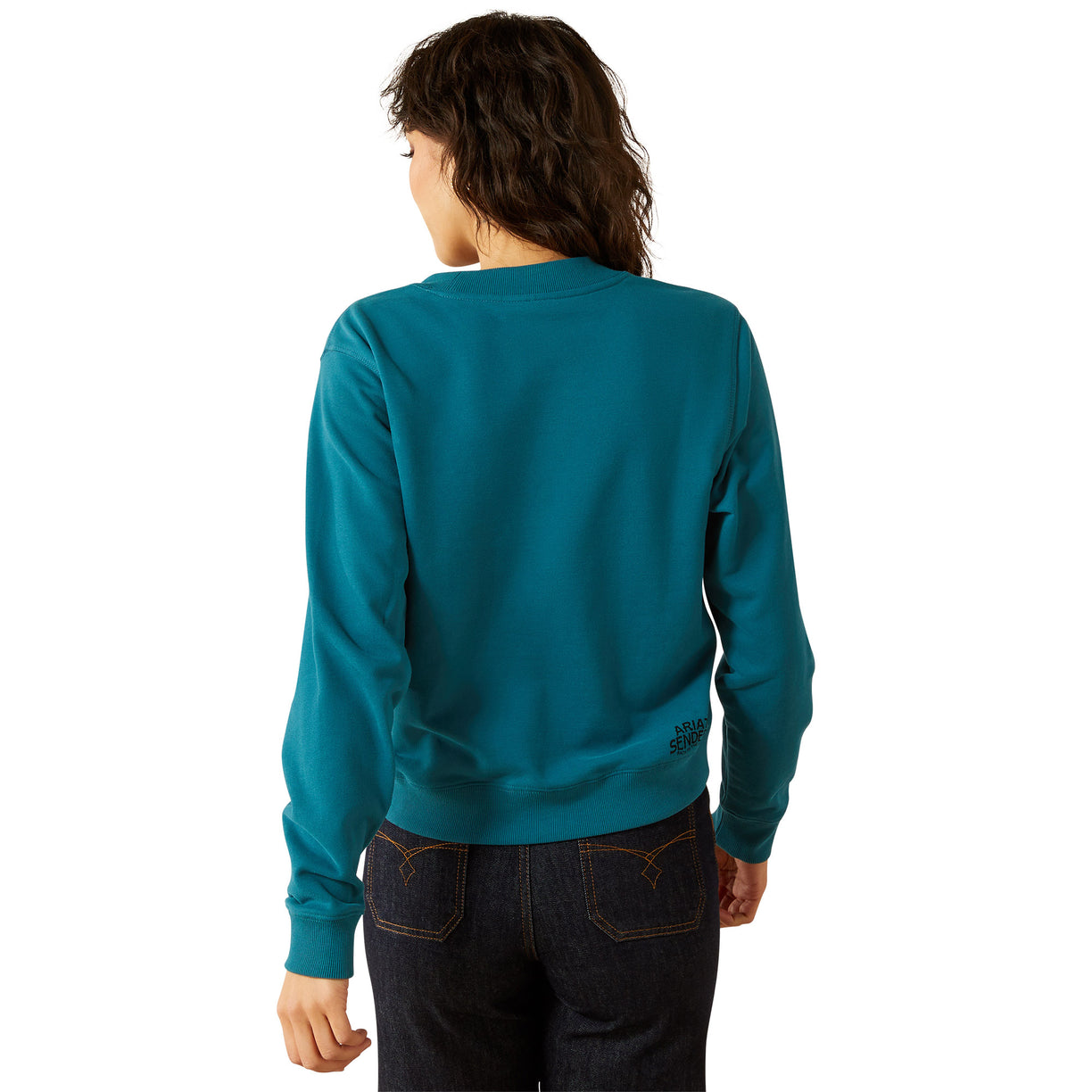 Person wearing a teal sweatshirt on a white background