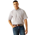 Man wearing a short-sleeve button-up shirt and jeans on a white background