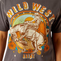 T-shirt with 'Wild West' and Ariat graphic design on a gray background
