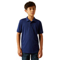 Young boy wearing a blue polo shirt on a white background
