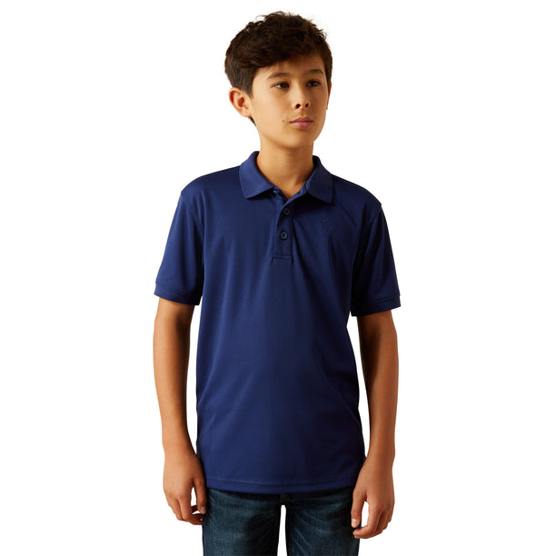 Young boy wearing a blue polo shirt on a white background